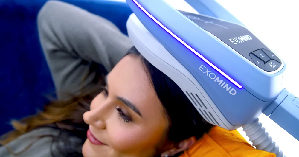 Woman getting ExoMind treatment