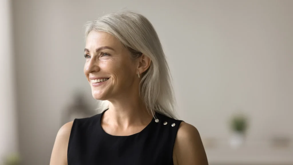 Woman with blonde hair looking to the side